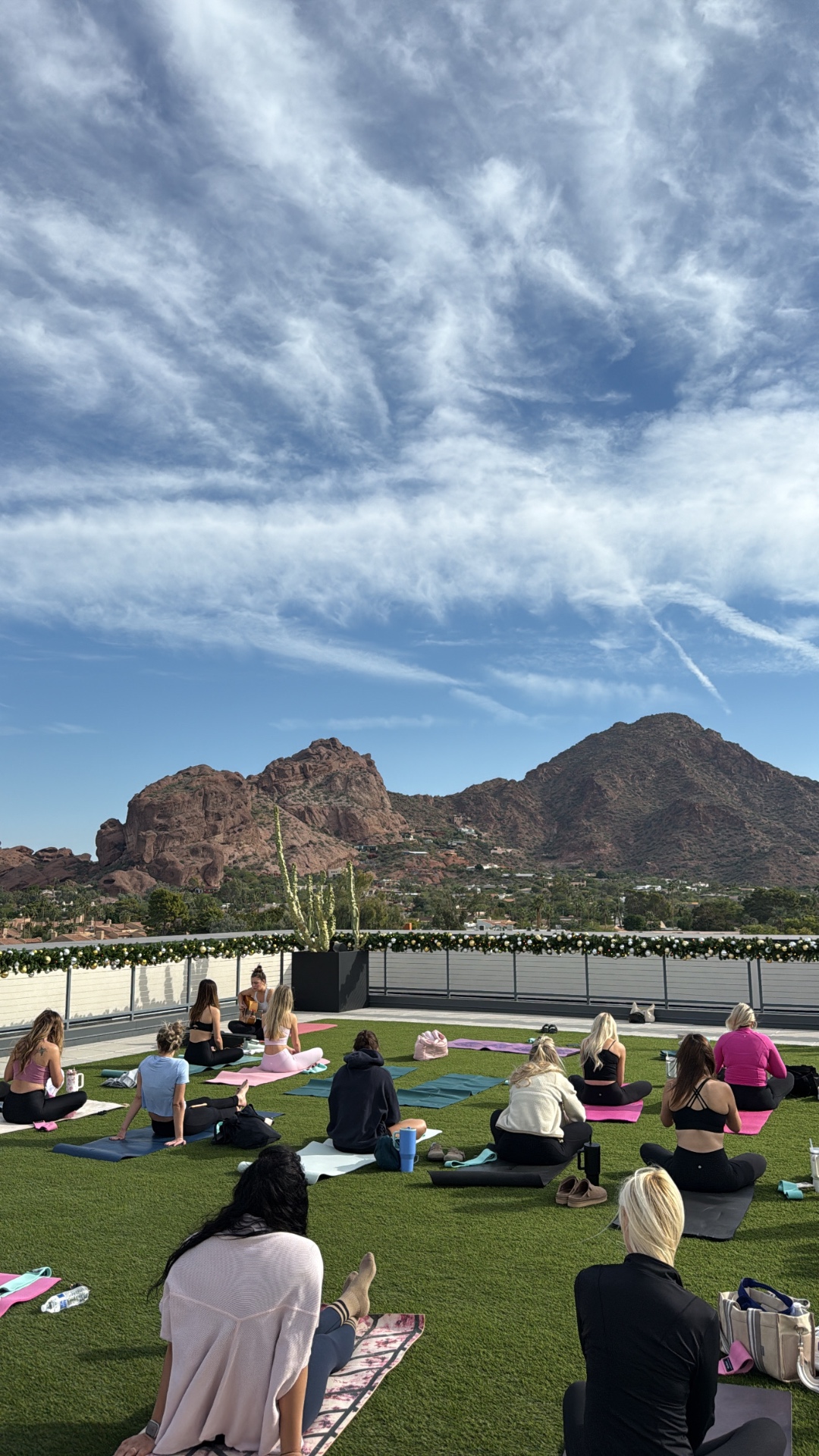 Rooftop class with Camelback Mountain
